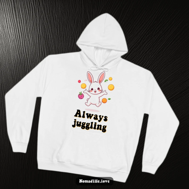 Funny bouncing bunny character juggling brightly colored fruit in mid-air, perfect for a cozy and humorous hoodie.
